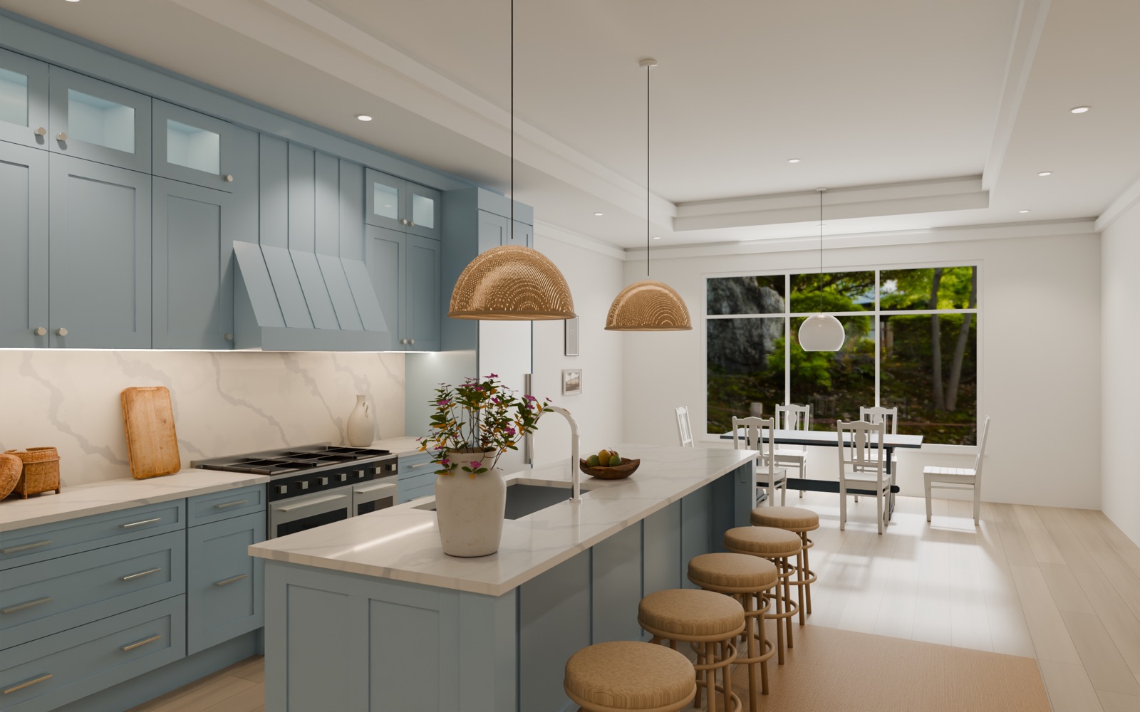 A pale blue shaker kitchen with glazed wall cupboards, a tapered hood over a range, and a long island with five rattan stools