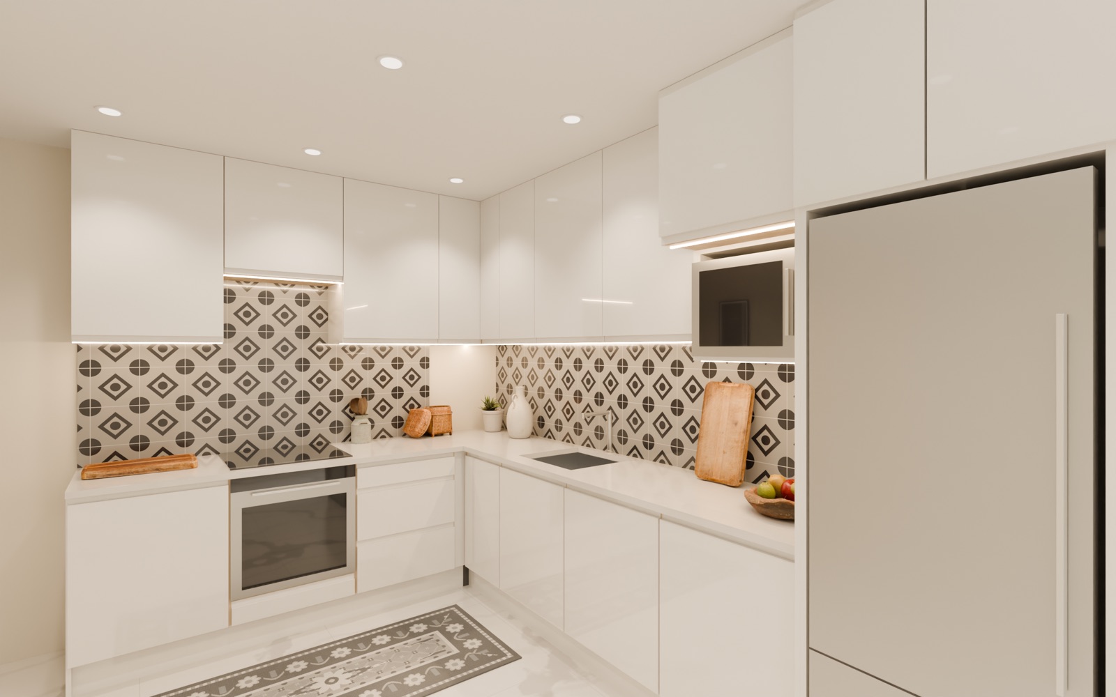 A white gloss handleless L shaped kitchen with a patterned tile splashback and a tall fridge