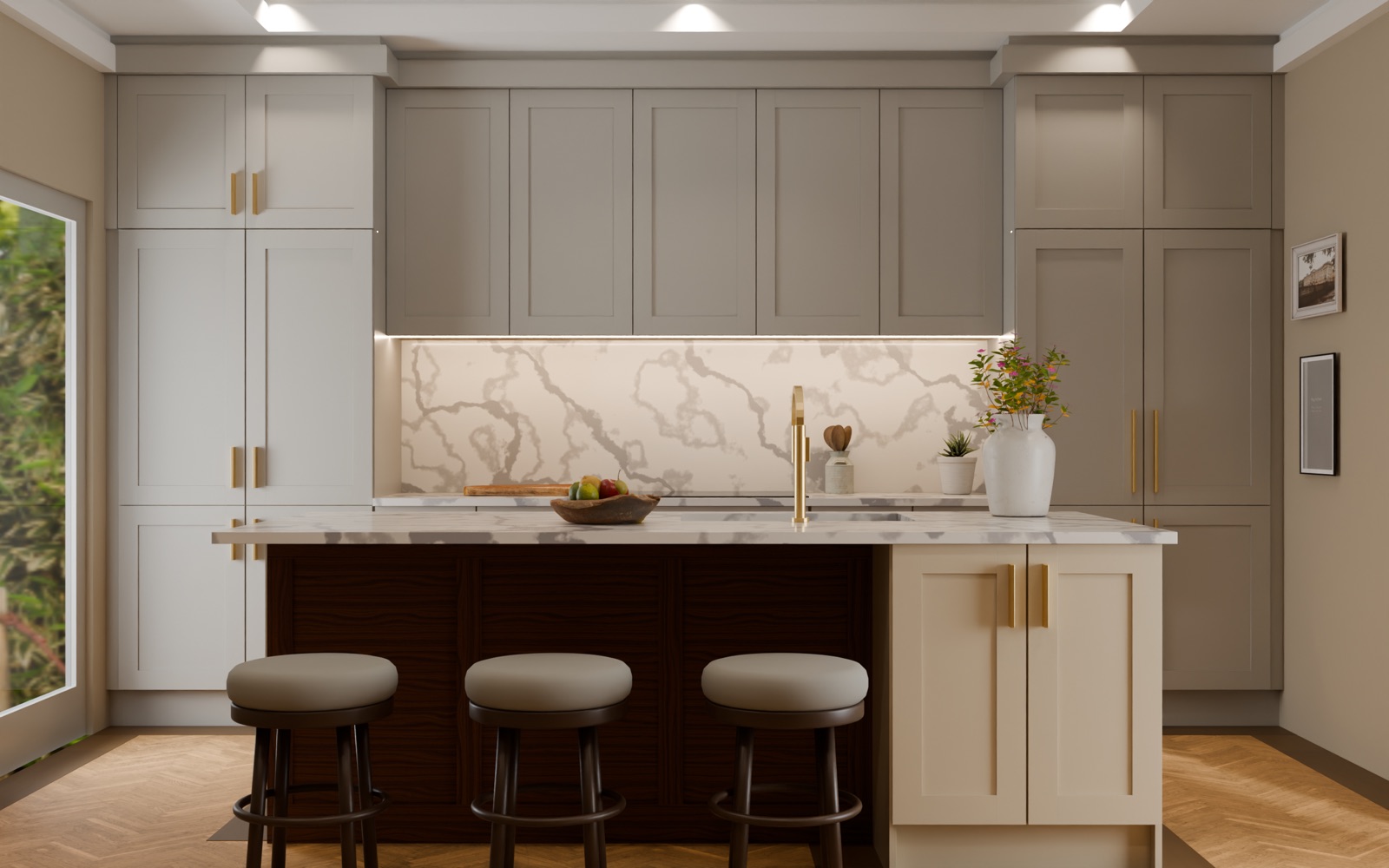 A greige painted shaker kitchen with tall housings either side, a marble splashback and a walnut island with three stools